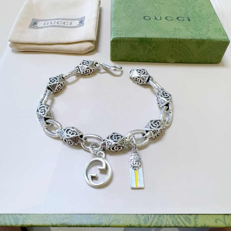 G*u*i bracelets